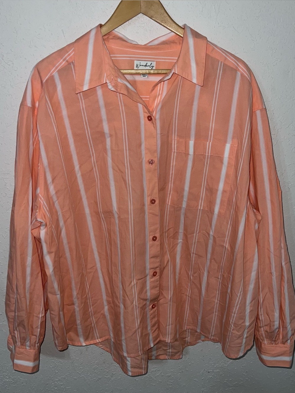 Wonderly Orange and White Striped
Long sleeve button down shirt Size 1X.